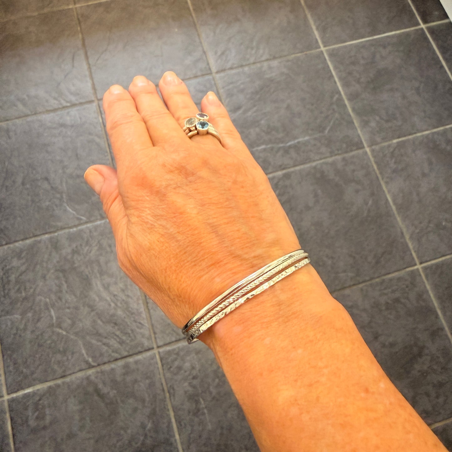 Triple Set of Bangles with Floating Diamond Cut Rings